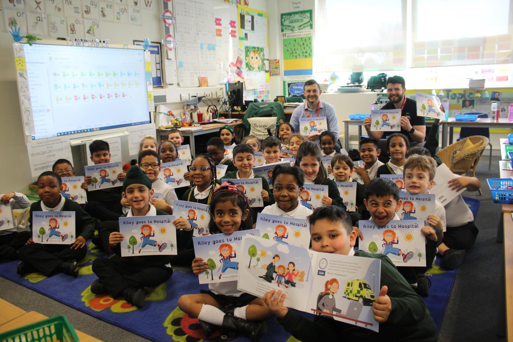 ModuleCo Social Value Visit to Eastbrook Primary School - Class Photograph With Books